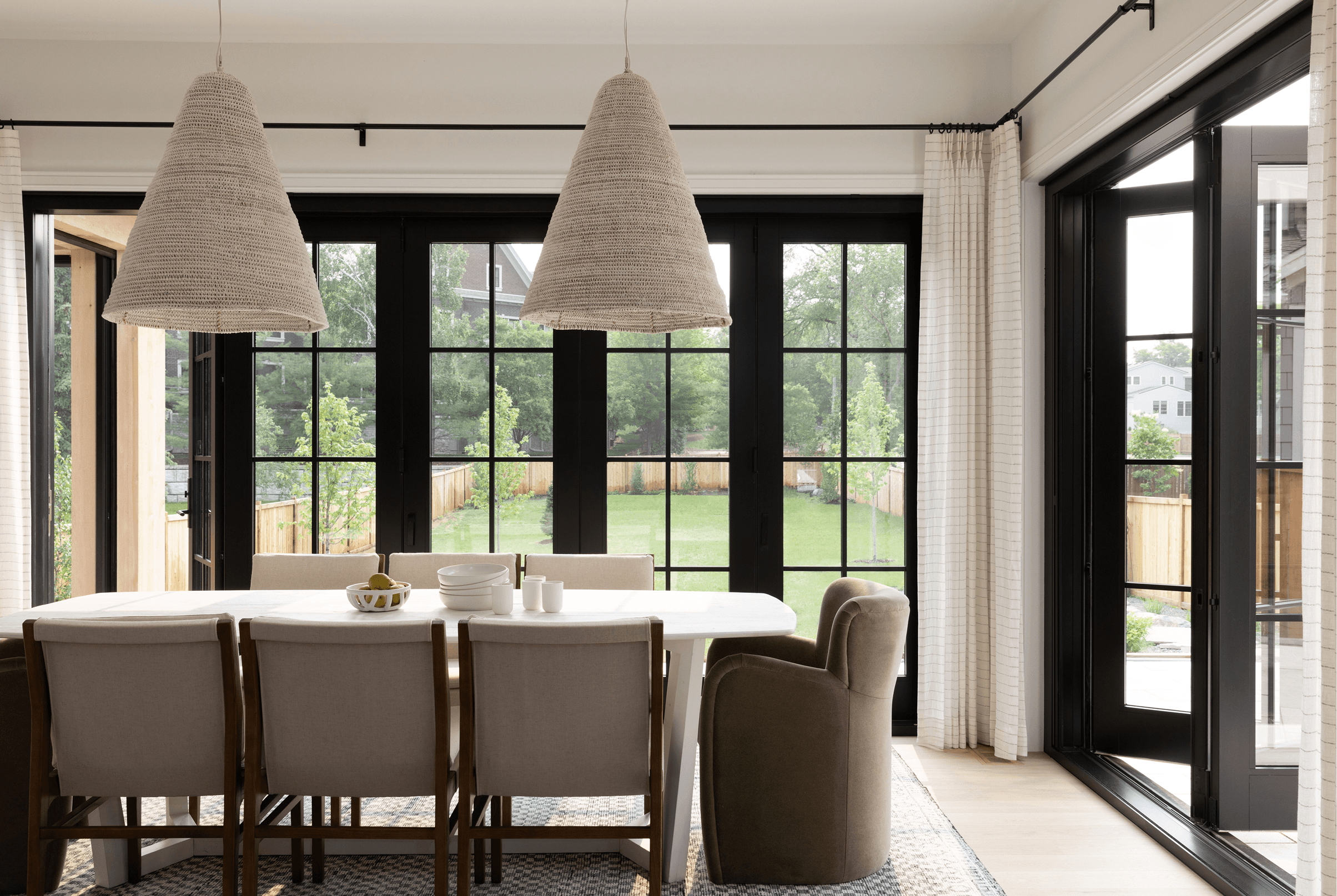 Dining room interior with a Marvin Ultimate Bi-Fold Door.