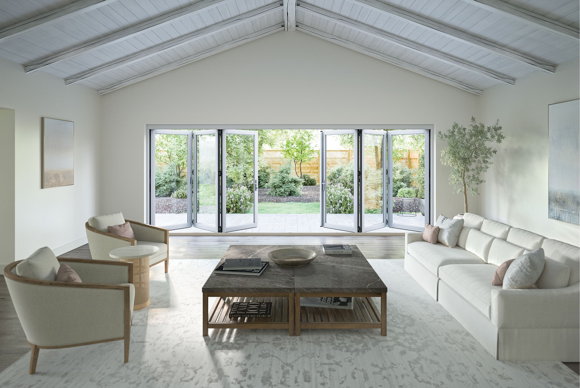 White living room interior featuring a large, white six-panel opened Marvin Elevate Bi-Fold Door.