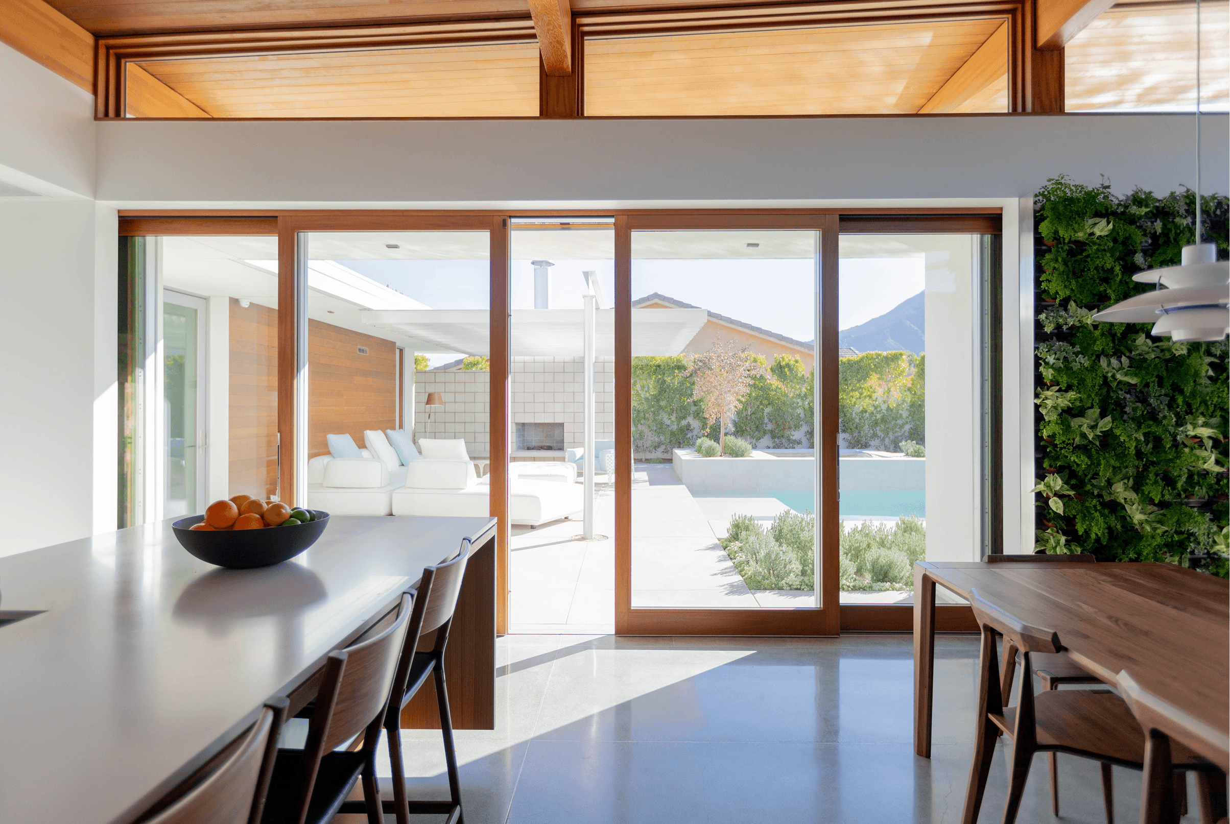 Home interior showing a Marvin Ultimate Lift and Slide Door opening to a patio.